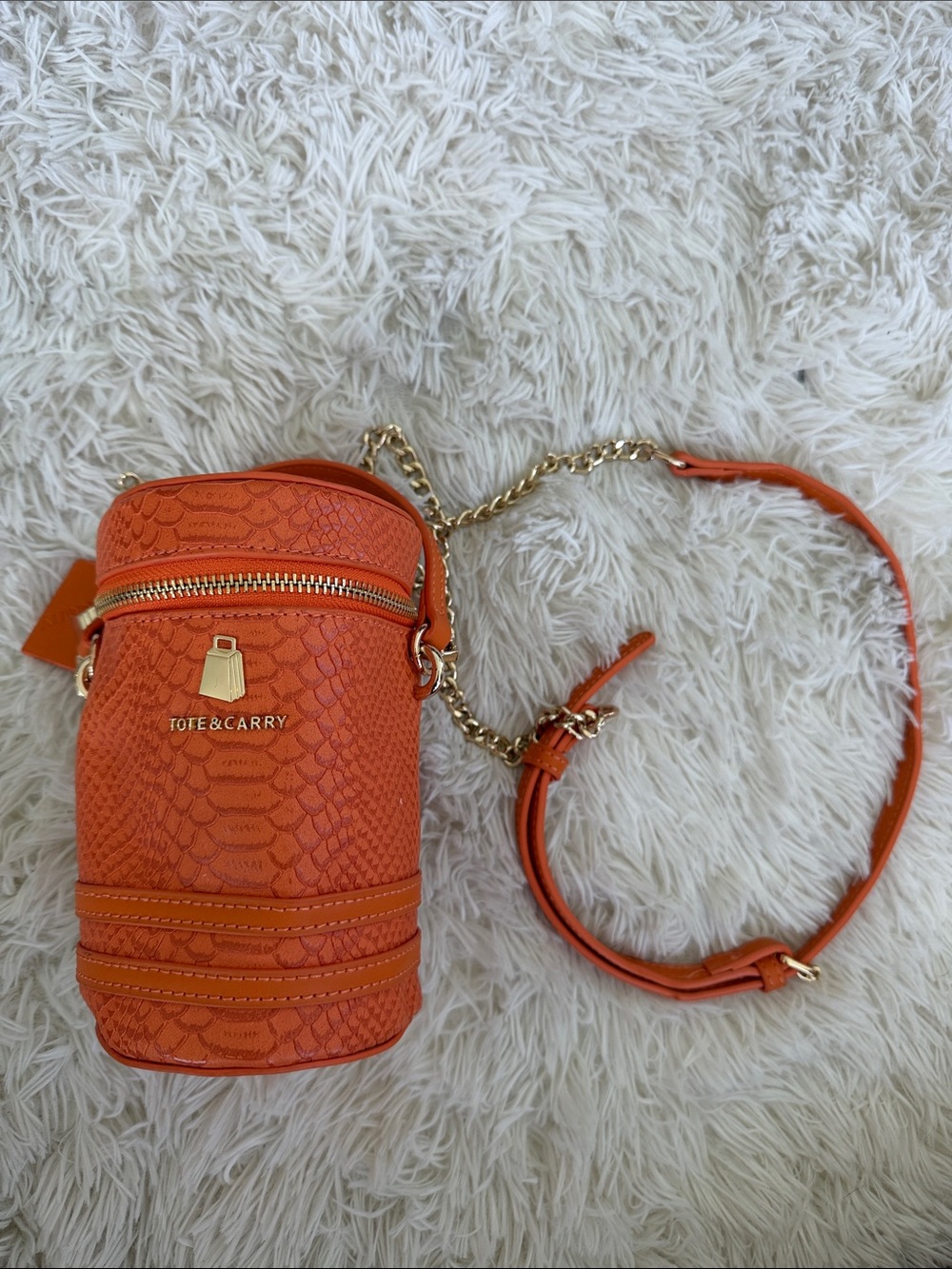 TOTE & CARRY Orange Textured Mini Crossbody Barrel Bottle Bag